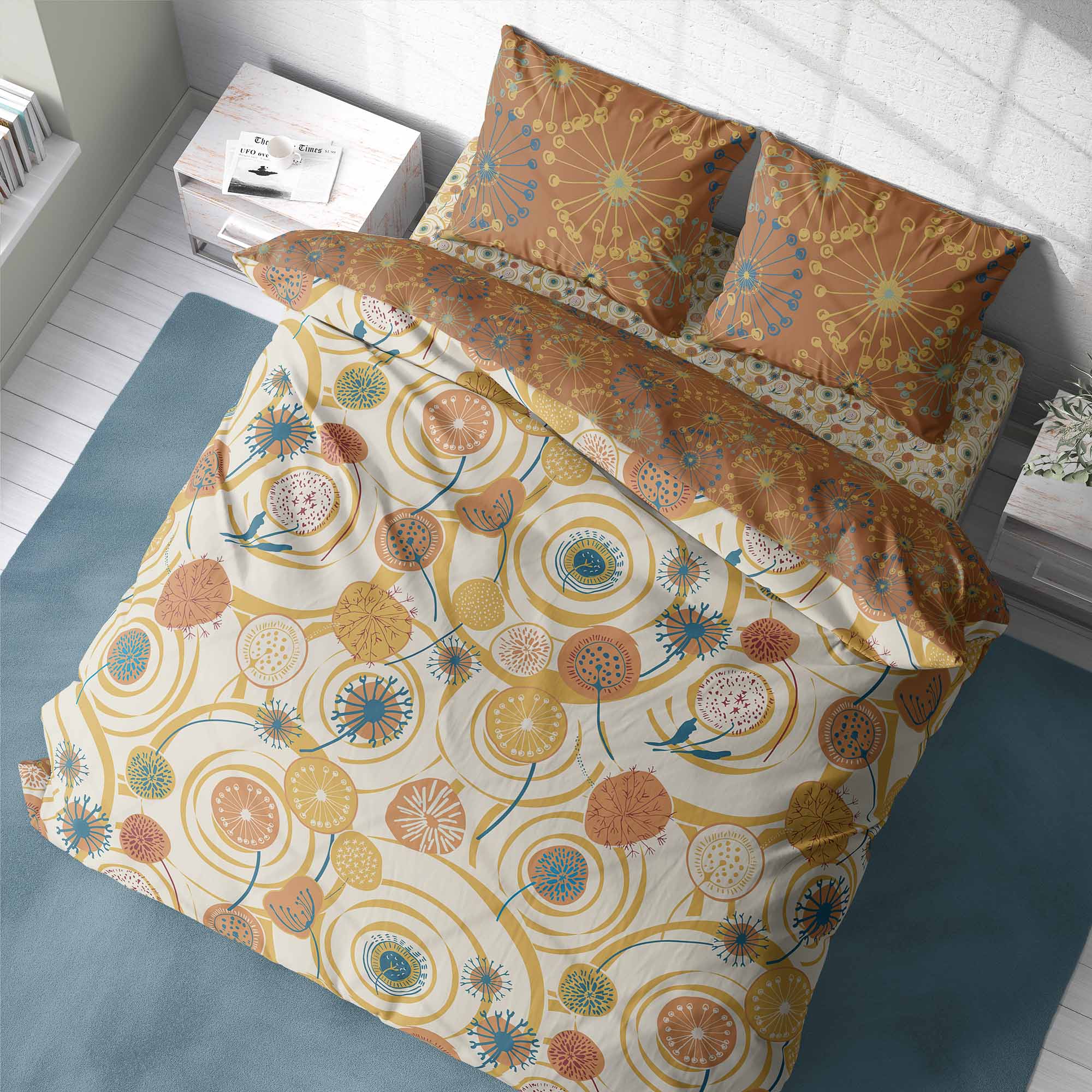 Bed linens from the Lakeside Connections patterns Swimming Dandies, and Raindrops. Colors in navy, teal, cream and rust