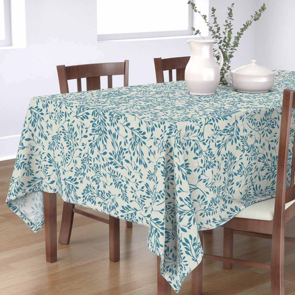 Tablecloth made from the pattern Lovely Laurels in cream and teal, jumbo scale. From the Lakeside Connections collection.